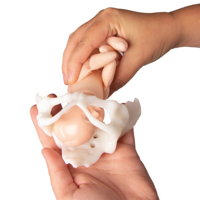 Minibekken met geboortepop